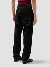 Pantaloni in denim trattato spruzzato - Abbigliamento Uomo | GCDS