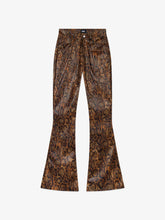 Pantaloni con stampa pitone
