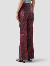 Pantaloni con stampa pitone