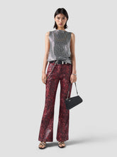 Pantaloni con stampa pitone
