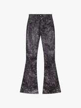 Pantaloni con stampa pitone